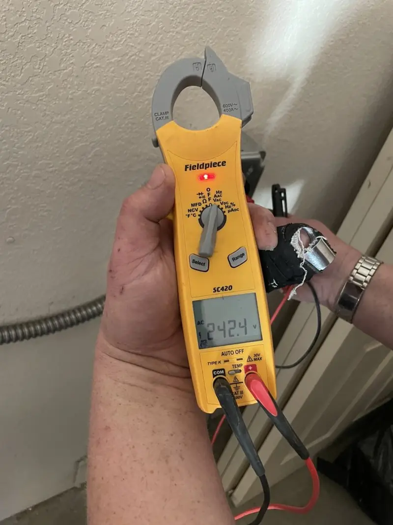 Voltage testing with clamp meter during Generator Installation in Carmel Valley Village